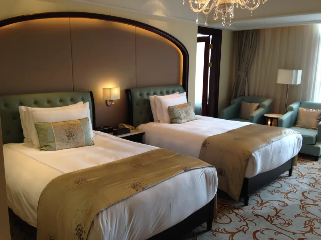 Luxurious hotel guest room with warm lighting